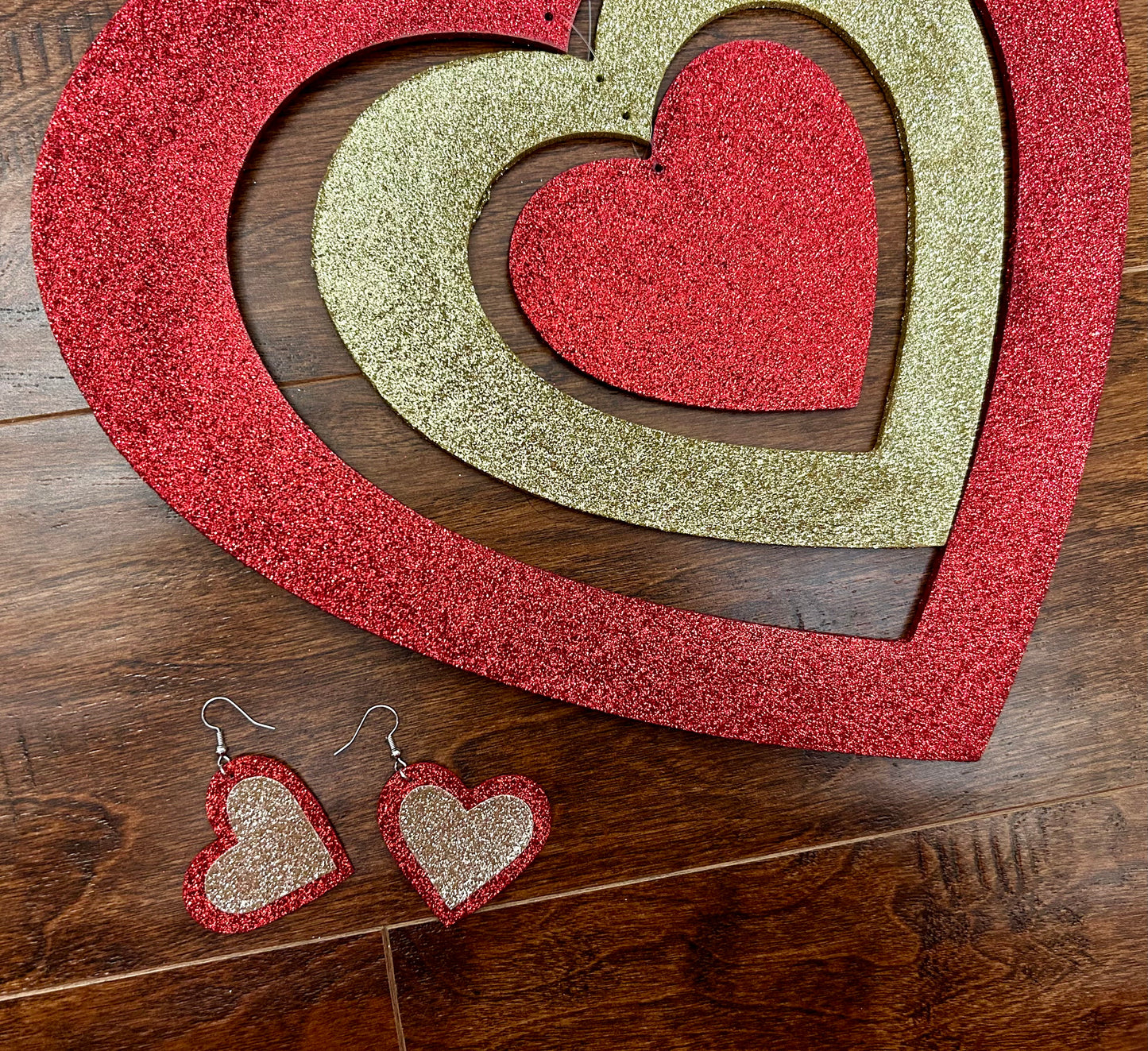 red-gold glitter heart leather earrings