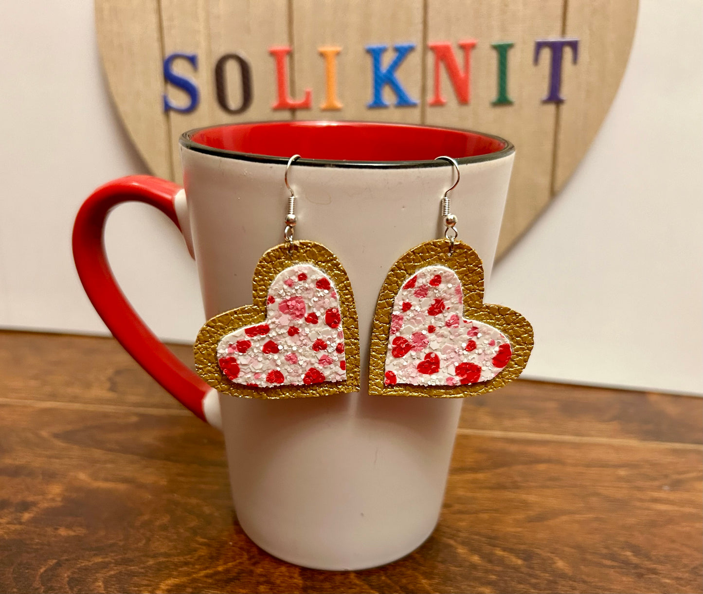 Gold-glitter heart leather earrings