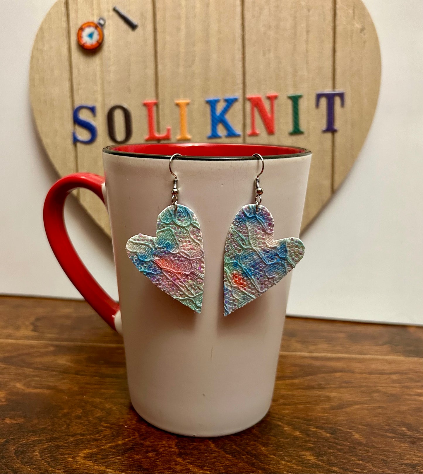 asymmetrical heart leather earrings