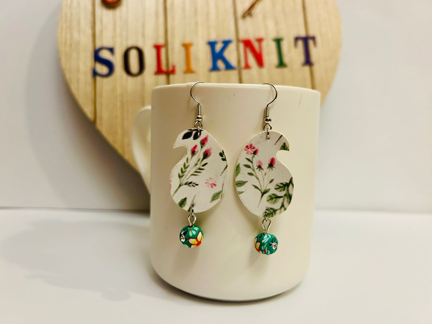 Green leaf Paisley leather earrings