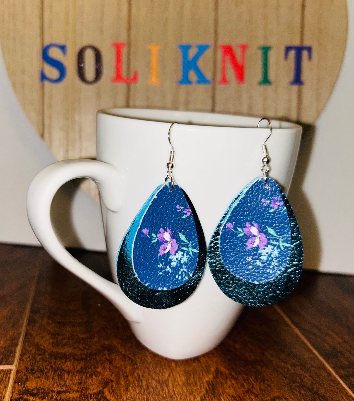 Blue and floral tear drop of double leaf leather earrings