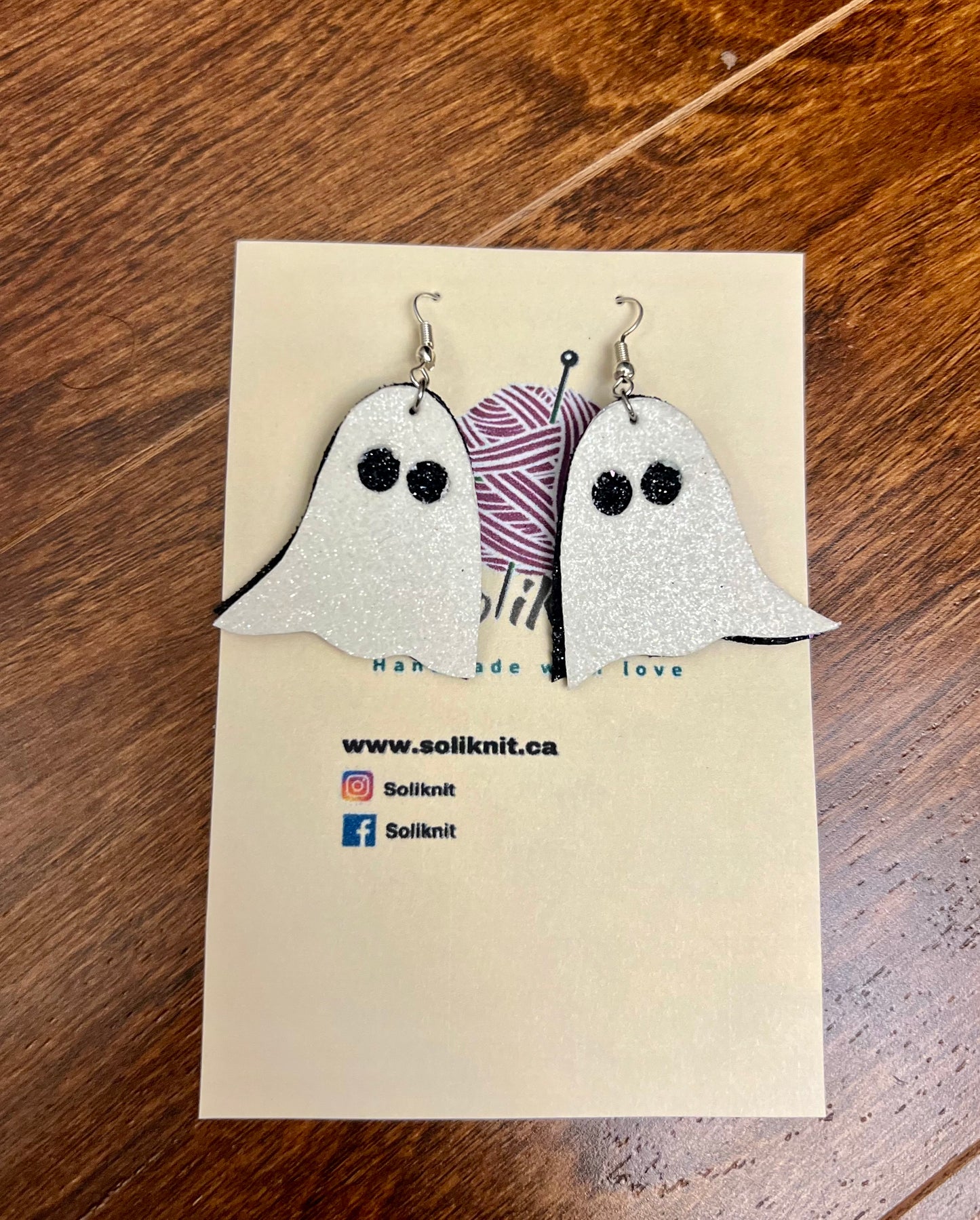 Black and white ghost earrings