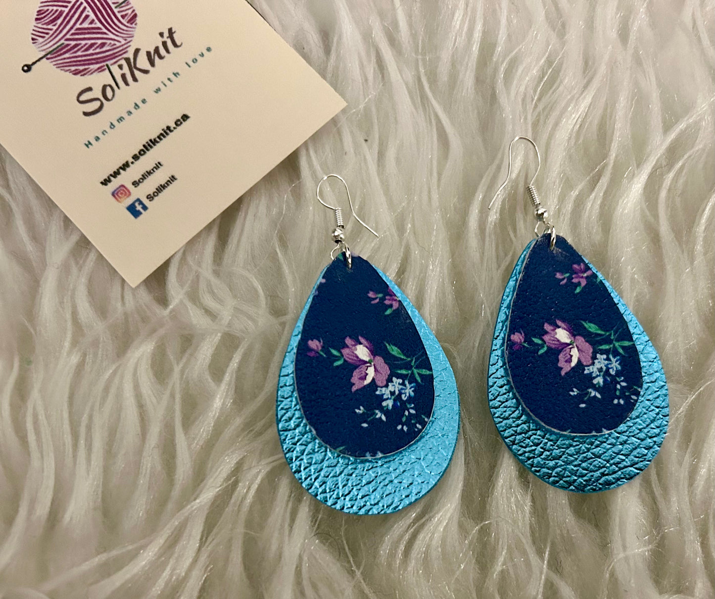 Blue and floral tear drop of double leaf leather earrings