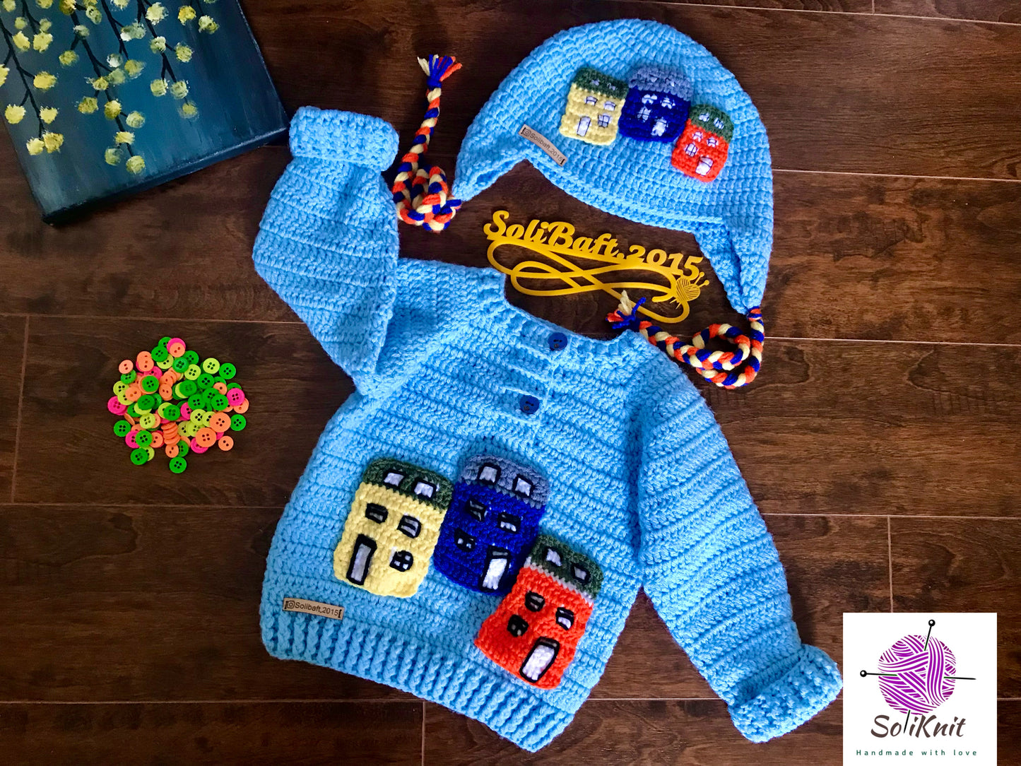 Colorful houses sweater